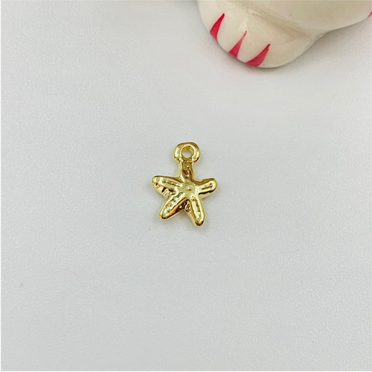 FO843 Colgante Mini Estrella de Mar 12x10 mm incluye argollita Figura Baño Oro Figuras Bañadas en Oro y Plata hecho de Bronce Bañado en Oro 18K Joyas Bañadas en Oro