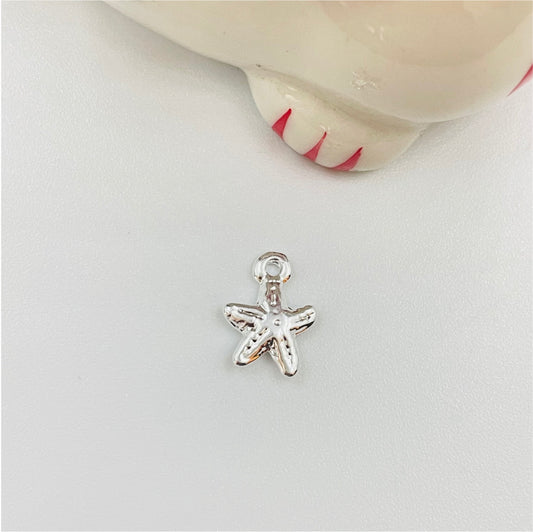 FP843 Colgante Mini Estrella de Mar 12x10 mm incluye argollita Figura Baño Plata Figuras Bañadas en Oro y Plata hecho de Bronce Bañado en Plata 50 ml Joyas Bañadas en Plata